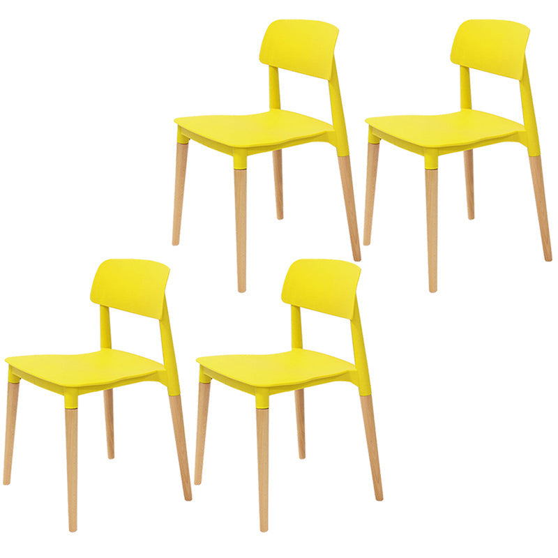 Plastic Stackable Armless Dining Chairs Open Back Side Chair with Wood Legs Yellow 4 Piece Set Clearhalo ' kitchen&dining_furn' 'Dining Chairs' 'Dining Tables & Seating' 'dining_chair' 'furn' 'furn_dining_chair' 'Furniture' 'furniture_dining_chair' 'Kitchen & Dining Furniture' 'kitchen' 3741311