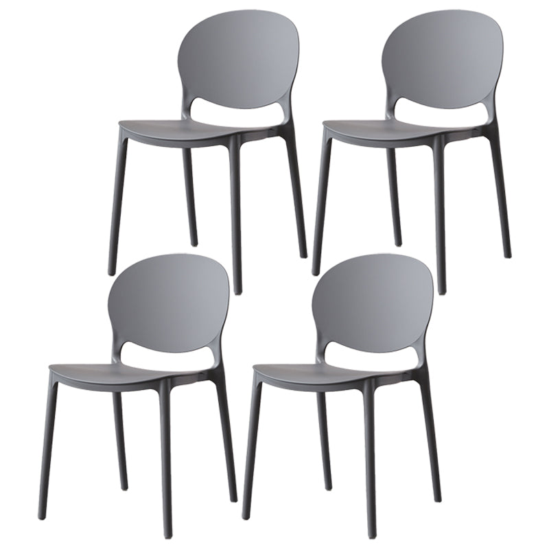 Scandinavian Armless Dining Chairs Stackable Plastic Open Back Side Chair Dark Gray 4 Piece Set Clearhalo ' kitchen&dining_furn' 'Dining Chairs' 'Dining Tables & Seating' 'dining_chair' 'furn' 'furn_dining_chair' 'Furniture' 'furniture_dining_chair' 'Kitchen & Dining Furniture' 'kitchen' 3755071