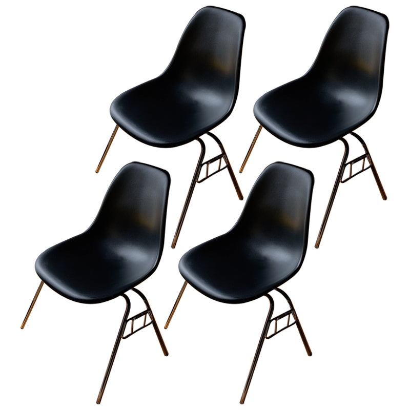 Minimalist Style Solid Back Plastic Chair for Home Use Stackable Armless Side Chair Black Set of 4 Clearhalo ' kitchen&dining_furn' 'Dining Chairs' 'Dining Tables & Seating' 'dining_chair' 'Furniture' 'furniture_dining_chair' 'Kitchen & Dining Furniture' 'kitchen' 3755397