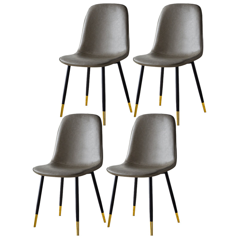 Glam Style Leather Dining Chairs for Kitchen Solid Back Armless Chairs Grey 4 Piece Set Brass Gold Clearhalo ' kitchen&dining_furn' 'Dining Chairs' 'Dining Tables & Seating' 'dining_chair' 'furn' 'furn_dining_chair' 'Furniture' 'furniture_dining_chair' 'Kitchen & Dining Furniture' 'kitchen' 3755629