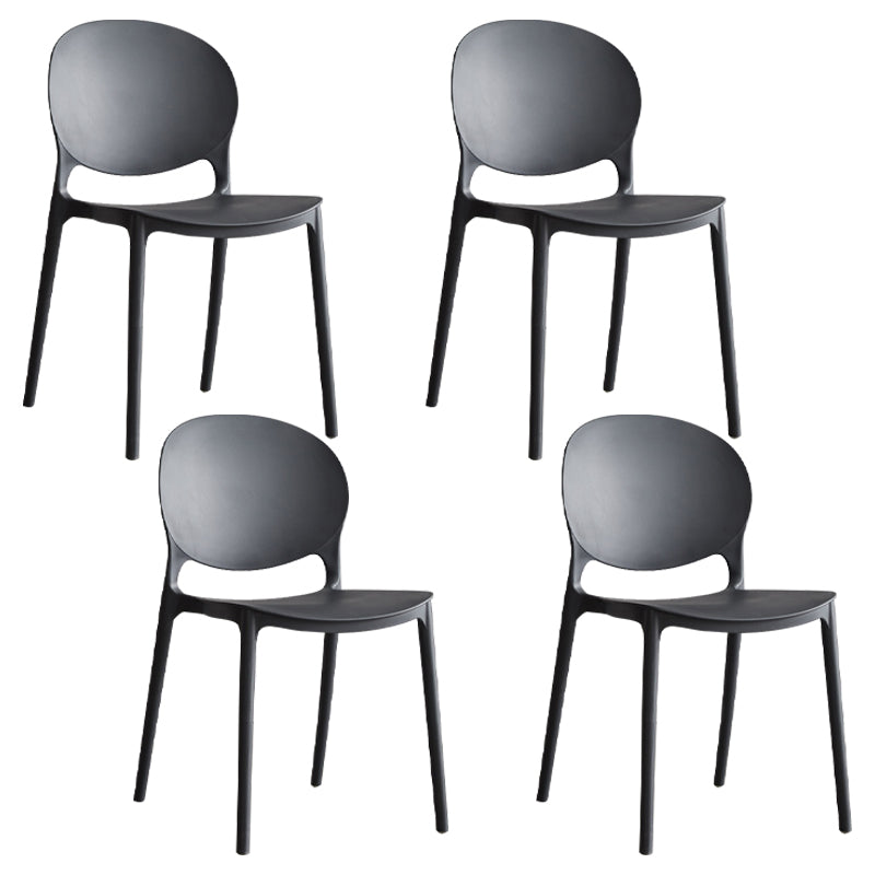 Scandinavian Armless Dining Chairs Plastic Indoor Stackable Open Back Side Chair Black 4 Piece Set Clearhalo ' kitchen&dining_furn' 'Dining Chairs' 'Dining Tables & Seating' 'dining_chair' 'furn' 'furn_dining_chair' 'Furniture' 'furniture_dining_chair' 'Kitchen & Dining Furniture' 'kitchen' 3779476