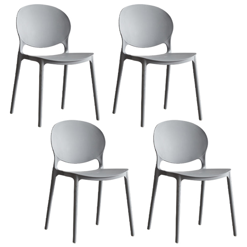 Scandinavian Armless Dining Chairs Plastic Indoor Stackable Open Back Side Chair Grey 4 Piece Set Clearhalo ' kitchen&dining_furn' 'Dining Chairs' 'Dining Tables & Seating' 'dining_chair' 'furn' 'furn_dining_chair' 'Furniture' 'furniture_dining_chair' 'Kitchen & Dining Furniture' 'kitchen' 3779479
