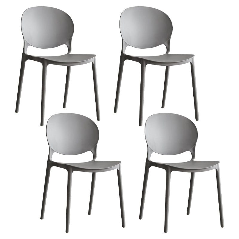 Scandinavian Armless Dining Chairs Plastic Indoor Stackable Open Back Side Chair Dark Gray 4 Piece Set Clearhalo ' kitchen&dining_furn' 'Dining Chairs' 'Dining Tables & Seating' 'dining_chair' 'furn' 'furn_dining_chair' 'Furniture' 'furniture_dining_chair' 'Kitchen & Dining Furniture' 'kitchen' 3779484