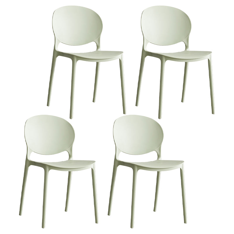 Scandinavian Armless Dining Chairs Plastic Indoor Stackable Open Back Side Chair Light Green 4 Piece Set Clearhalo ' kitchen&dining_furn' 'Dining Chairs' 'Dining Tables & Seating' 'dining_chair' 'furn' 'furn_dining_chair' 'Furniture' 'furniture_dining_chair' 'Kitchen & Dining Furniture' 'kitchen' 3779512