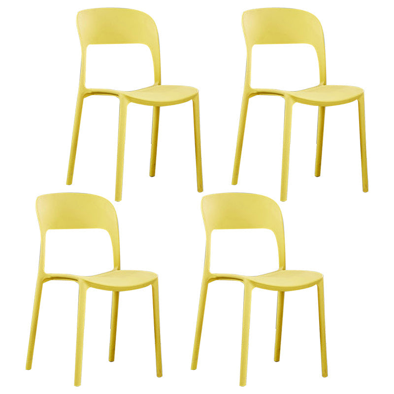 Scandinavian Armless Dining Chairs Plastic Indoor Open Back Side Chair Yellow 4 Piece Set Clearhalo ' kitchen&dining_furn' 'Dining Chairs' 'Dining Tables & Seating' 'dining_chair' 'furn' 'furn_dining_chair' 'Furniture' 'furniture_dining_chair' 'Kitchen & Dining Furniture' 'kitchen' 3779686