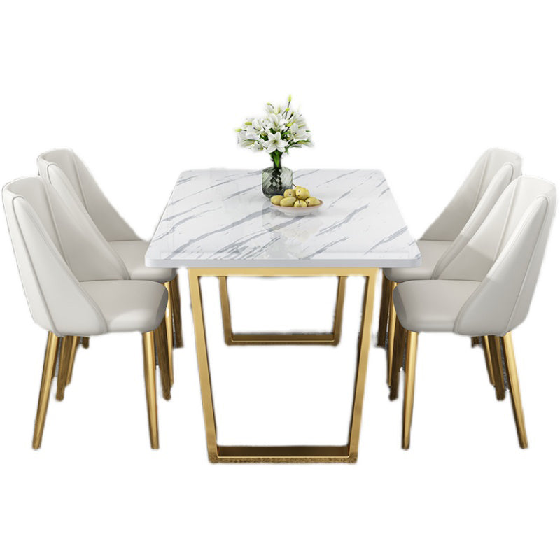 Table rectangulaire de luxe traditionnelle en métal, table en pierre frittée blanche avec base luge