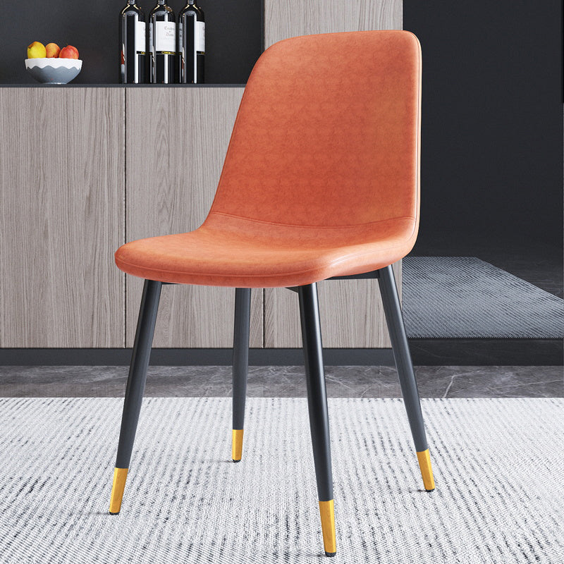 Home Scandinavian Side Chair Solid Back Metal Dining Room Chair with Black Legs Orange 1 Piece Brass Gold Clearhalo ' kitchen&dining_furn' 'Dining Chairs' 'Dining Tables & Seating' 'dining_chair' 'furn' 'furn_dining_chair' 'Furniture' 'furniture_dining_chair' 'Kitchen & Dining Furniture' 'kitchen' 3827687