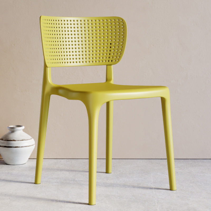 Modern Indoor-Outdoor Plastic Side Chair Armless Open Back Dining Chair Yellow 1 Piece Clearhalo ' kitchen&dining_furn' 'Dining Chairs' 'Dining Tables & Seating' 'dining_chair' 'furn' 'furn_dining_chair' 'Furniture' 'furniture_dining_chair' 'Kitchen & Dining Furniture' 'kitchen' 3847204