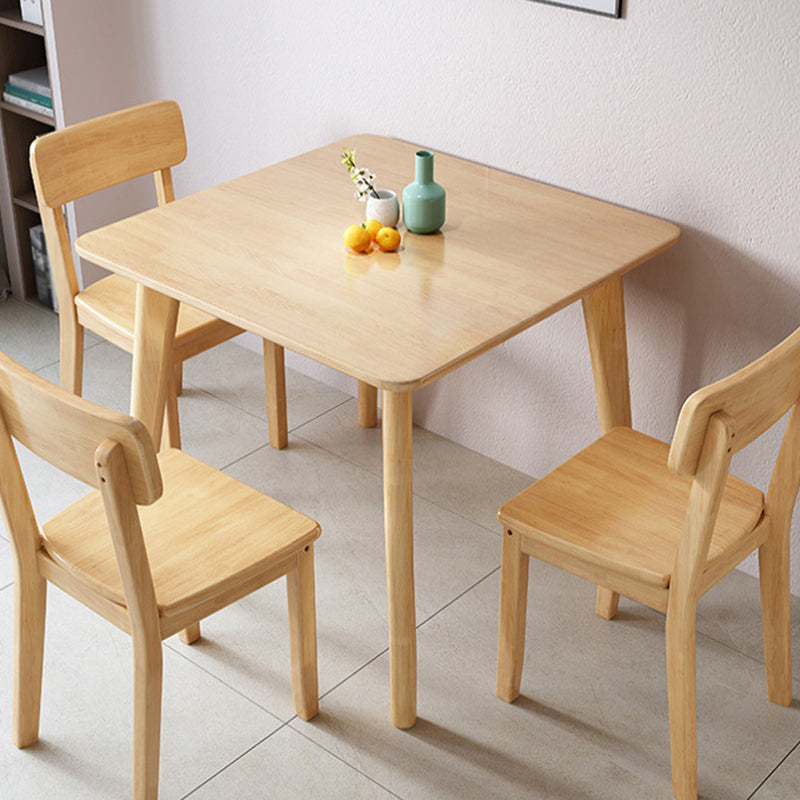 Square 4 Legs Industrial Dining Table Wood Color Fixed Table of Solid Wood Clearhalo ' dining_table' 'Dining Tables & Seating' 'Dining Tables' 'furn' 'furn_dining_table' 'Furniture' 'furniture_dining_table' 'Kitchen & Dining Furniture' 'kitchen&dining_furn' 'kitchen' 'kitchen_dining_table' 3886129