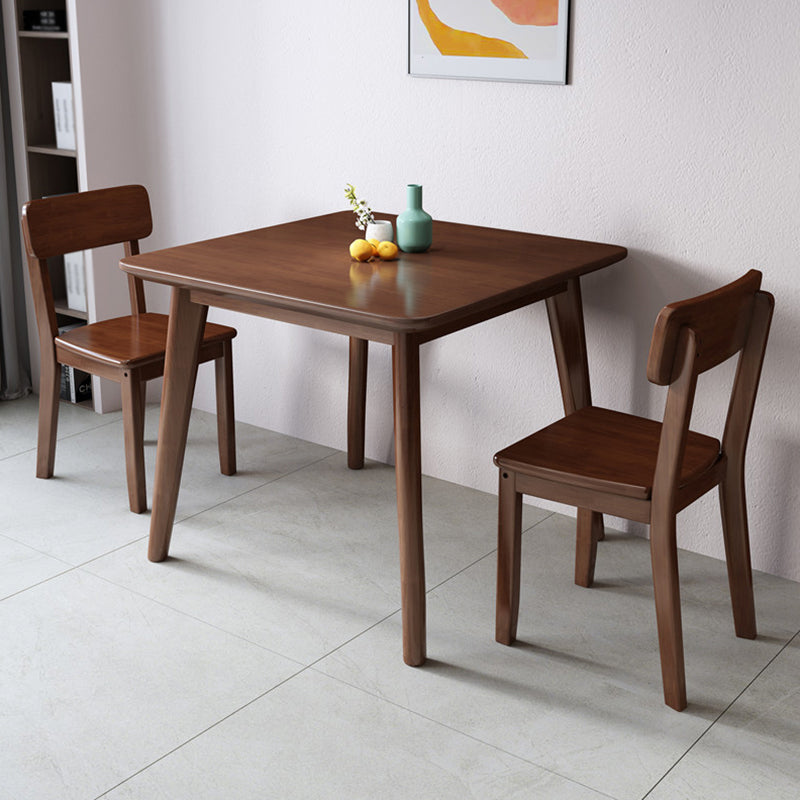 Square 4 Legs Industrial Dining Table Wood Color Fixed Table of Solid Wood Clearhalo ' dining_table' 'Dining Tables & Seating' 'Dining Tables' 'furn' 'furn_dining_table' 'Furniture' 'furniture_dining_table' 'Kitchen & Dining Furniture' 'kitchen&dining_furn' 'kitchen' 'kitchen_dining_table' 3886132