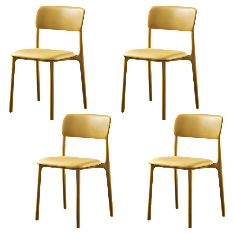 Modern Style Plastic Dining Chairs Open Back Dining Stackable Side Chairs for Kitchen Yellow Faux Leather 4 Piece Set Clearhalo ' kitchen&dining_furn' 'Dining Chairs' 'Dining Tables & Seating' 'dining_chair' 'furn' 'furn_dining_chair' 'Furniture' 'furniture_dining_chair' 'Kitchen & Dining Furniture' 'kitchen' 3910188