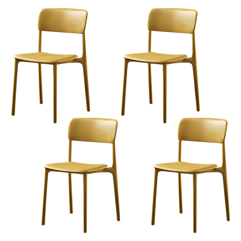 Modern Style Plastic Dining Chairs Open Back Dining Stackable Side Chairs for Kitchen Yellow Plastic & Acrylic 4 Piece Set Clearhalo ' kitchen&dining_furn' 'Dining Chairs' 'Dining Tables & Seating' 'dining_chair' 'furn' 'furn_dining_chair' 'Furniture' 'furniture_dining_chair' 'Kitchen & Dining Furniture' 'kitchen' 3910206