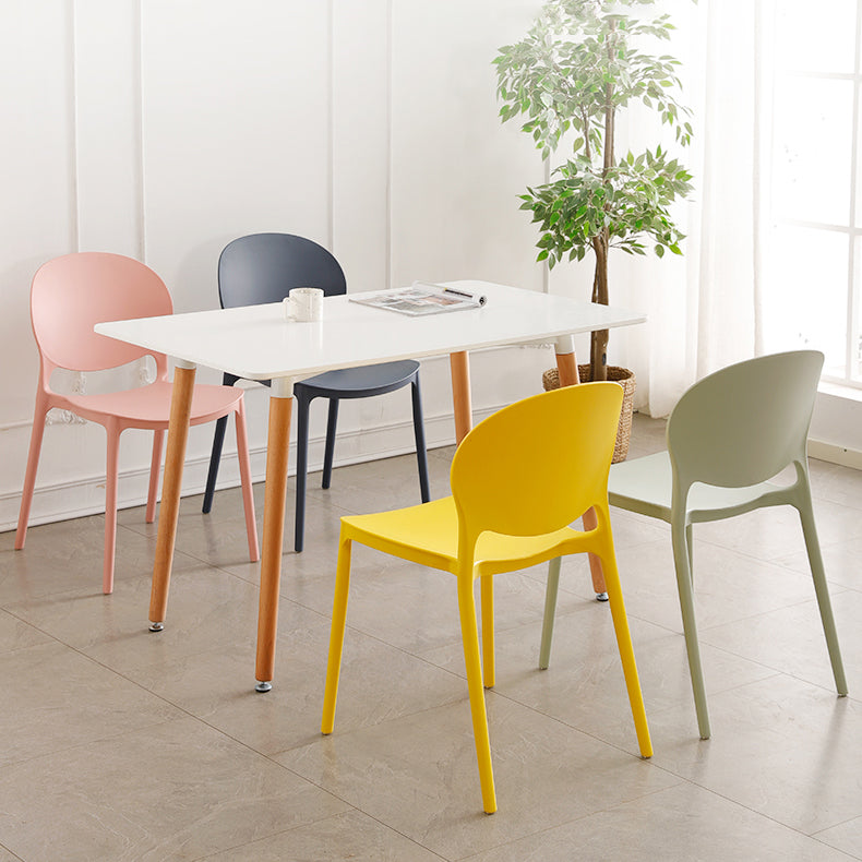 Plastic Stackable Armless Dining Chairs Open Back Side Chair (Set of 4) Clearhalo ' kitchen&dining_furn' 'Dining Chairs' 'Dining Tables & Seating' 'dining_chair' 'furn' 'furn_dining_chair' 'Furniture' 'furniture_dining_chair' 'Kitchen & Dining Furniture' 'kitchen' 3945026