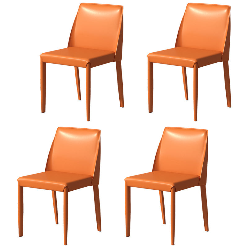 Scandinavian Leather Dining Chairs Solid Back Armless Dining Side Chairs Orange 4 Piece Set Clearhalo ' kitchen&dining_furn' 'Dining Chairs' 'Dining Tables & Seating' 'dining_chair' 'furn' 'furn_dining_chair' 'Furniture' 'furniture_dining_chair' 'Kitchen & Dining Furniture' 'kitchen' 3951010