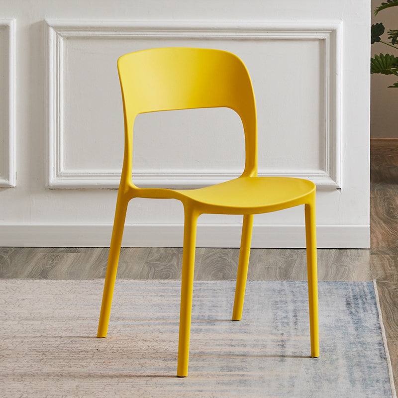 Contemporary Plastic Side Chair Home Stacking Open Back Armless Dining Side Chair Yellow 1 Piece Clearhalo ' kitchen&dining_furn' 'Dining Chairs' 'Dining Tables & Seating' 'dining_chair' 'furn' 'furn_dining_chair' 'Furniture' 'furniture_dining_chair' 'Kitchen & Dining Furniture' 'kitchen' 3956068