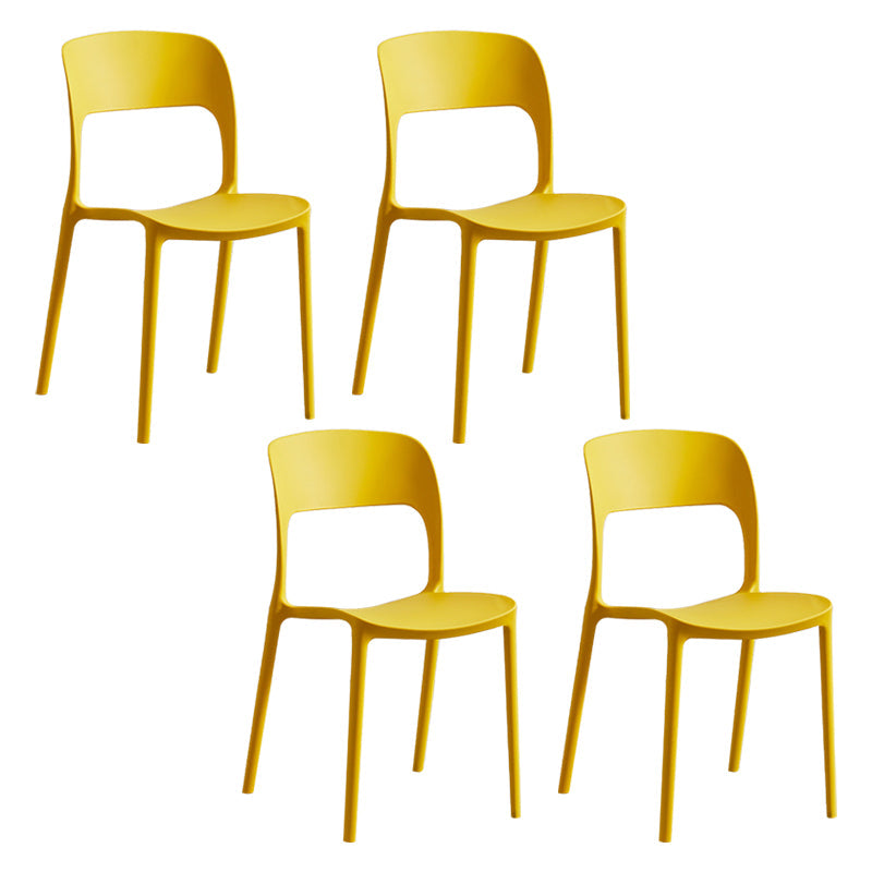 Contemporary Plastic Side Chair Home Stacking Open Back Armless Dining Side Chair Yellow 4 Piece Set Clearhalo ' kitchen&dining_furn' 'Dining Chairs' 'Dining Tables & Seating' 'dining_chair' 'furn' 'furn_dining_chair' 'Furniture' 'furniture_dining_chair' 'Kitchen & Dining Furniture' 'kitchen' 3956072