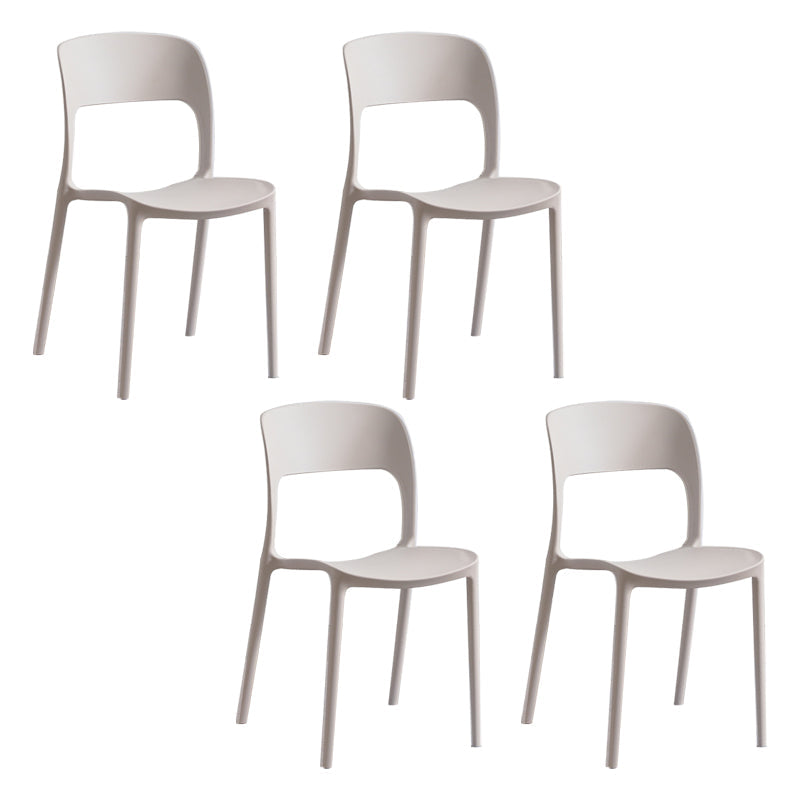 Contemporary Plastic Side Chair Home Stacking Open Back Armless Dining Side Chair White 4 Piece Set Clearhalo ' kitchen&dining_furn' 'Dining Chairs' 'Dining Tables & Seating' 'dining_chair' 'furn' 'furn_dining_chair' 'Furniture' 'furniture_dining_chair' 'Kitchen & Dining Furniture' 'kitchen' 3956084