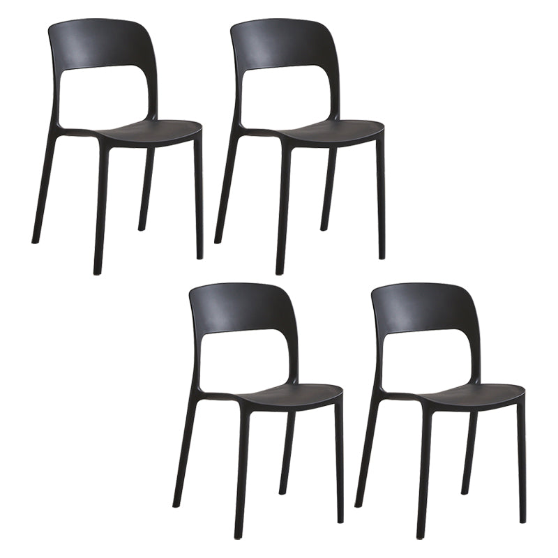 Contemporary Plastic Side Chair Home Stacking Open Back Armless Dining Side Chair Black 4 Piece Set Clearhalo ' kitchen&dining_furn' 'Dining Chairs' 'Dining Tables & Seating' 'dining_chair' 'furn' 'furn_dining_chair' 'Furniture' 'furniture_dining_chair' 'Kitchen & Dining Furniture' 'kitchen' 3956102
