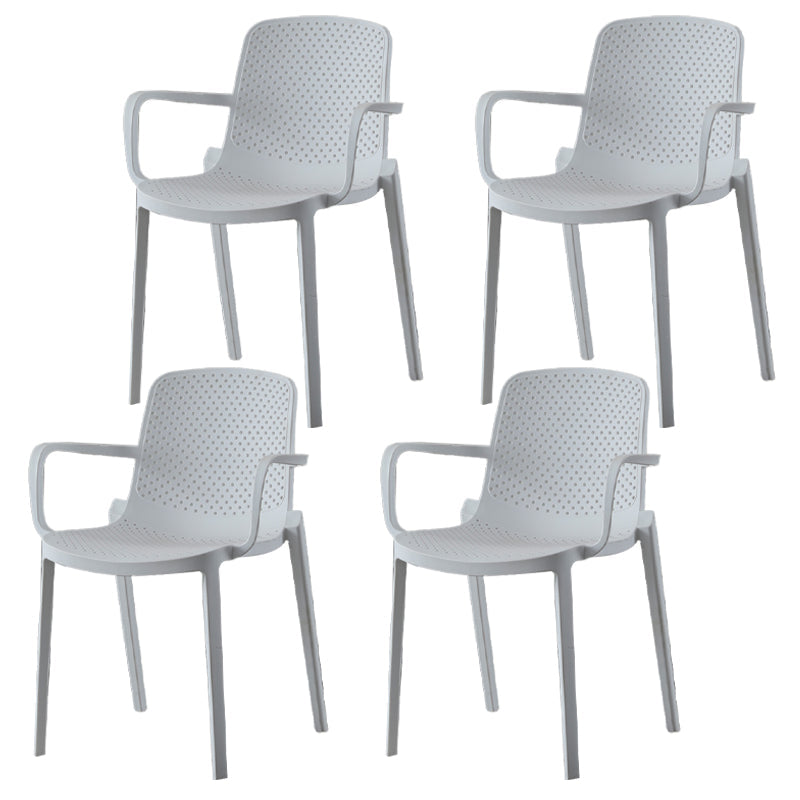 Contemporary Style Plastic Dining Arm Chairs Solid Back Stackable Chairs White 4 Piece Set Clearhalo ' kitchen&dining_furn' 'Dining Chairs' 'Dining Tables & Seating' 'dining_chair' 'furn' 'furn_dining_chair' 'Furniture' 'furniture_dining_chair' 'Kitchen & Dining Furniture' 'kitchen' 3957683