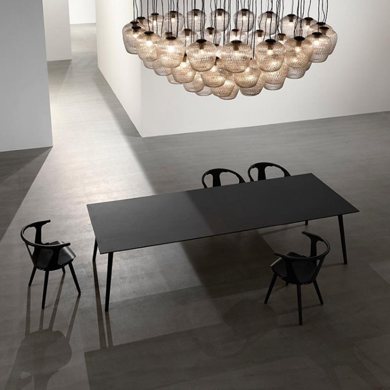 Rectangle Shape Wood Color Dining Table Solid Wood Table Minimalist with 4 Legs Black Without Chairs Clearhalo ' dining_table' 'Dining Tables & Seating' 'Dining Tables' 'furn' 'furn_dining_table' 'Furniture' 'furniture_dining_table' 'Kitchen & Dining Furniture' 'kitchen&dining_furn' 'kitchen' 'kitchen_dining_table' 3959491