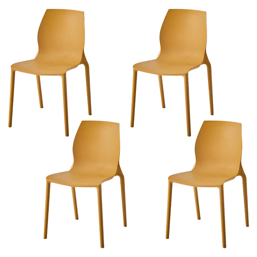 Stackable Plastic Dining Side Chair Scandinavian Solid Back Armless Dining Chairs Yellow 4 Piece Set Clearhalo ' kitchen&dining_furn' 'Dining Chairs' 'Dining Tables & Seating' 'dining_chair' 'furn' 'furn_dining_chair' 'Furniture' 'furniture_dining_chair' 'Kitchen & Dining Furniture' 'kitchen' 3968366