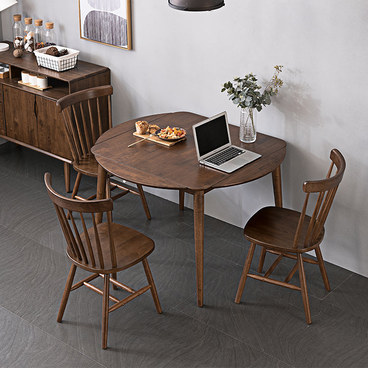 Extendable Round Dining Table in Brown Modern Adjustable Rubber Wood Table with 4 Legs Clearhalo ' dining_table' 'Dining Tables & Seating' 'Dining Tables' 'furn' 'furn_dining_table' 'Furniture' 'furniture_dining_table' 'Kitchen & Dining Furniture' 'kitchen&dining_furn' 'kitchen' 'kitchen_dining_table' 3979627