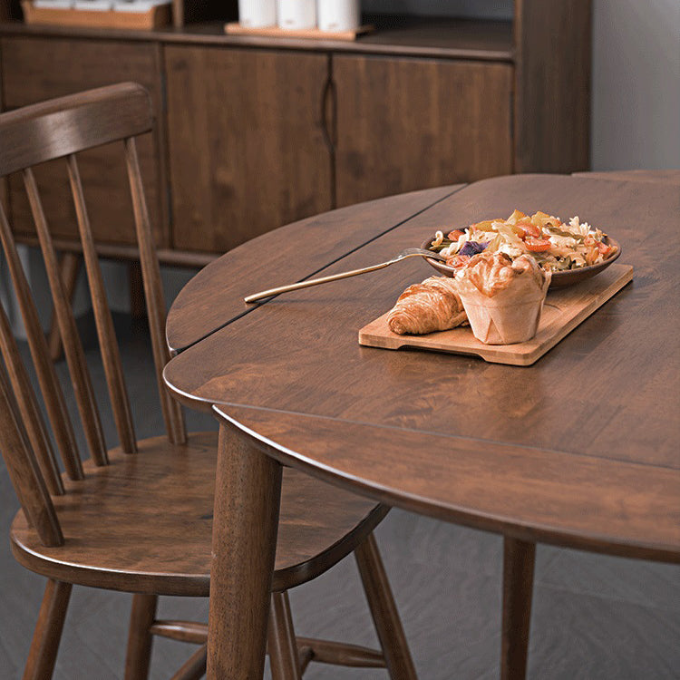 Extendable Round Dining Table in Brown Modern Adjustable Rubber Wood Table with 4 Legs Clearhalo ' dining_table' 'Dining Tables & Seating' 'Dining Tables' 'furn' 'furn_dining_table' 'Furniture' 'furniture_dining_table' 'Kitchen & Dining Furniture' 'kitchen&dining_furn' 'kitchen' 'kitchen_dining_table' 3979630