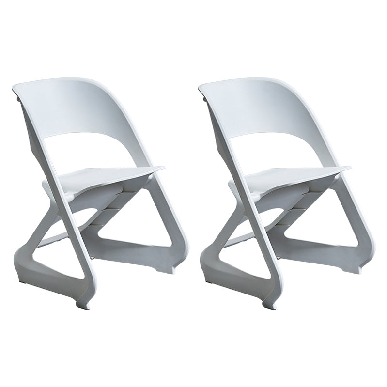 Minimalist Style Plastic Dining Armless Chairs Open Back Dining Side Chairs White 2 Piece Set Clearhalo ' kitchen&dining_furn' 'Dining Chairs' 'Dining Tables & Seating' 'dining_chair' 'furn' 'furn_dining_chair' 'Furniture' 'furniture_dining_chair' 'Kitchen & Dining Furniture' 'kitchen' 3997749