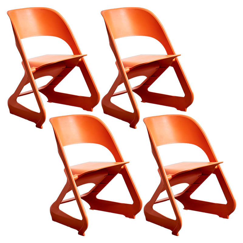 Minimalist Style Plastic Dining Armless Chairs Open Back Dining Side Chairs Orange 4 Piece Set Clearhalo ' kitchen&dining_furn' 'Dining Chairs' 'Dining Tables & Seating' 'dining_chair' 'furn' 'furn_dining_chair' 'Furniture' 'furniture_dining_chair' 'Kitchen & Dining Furniture' 'kitchen' 3997767