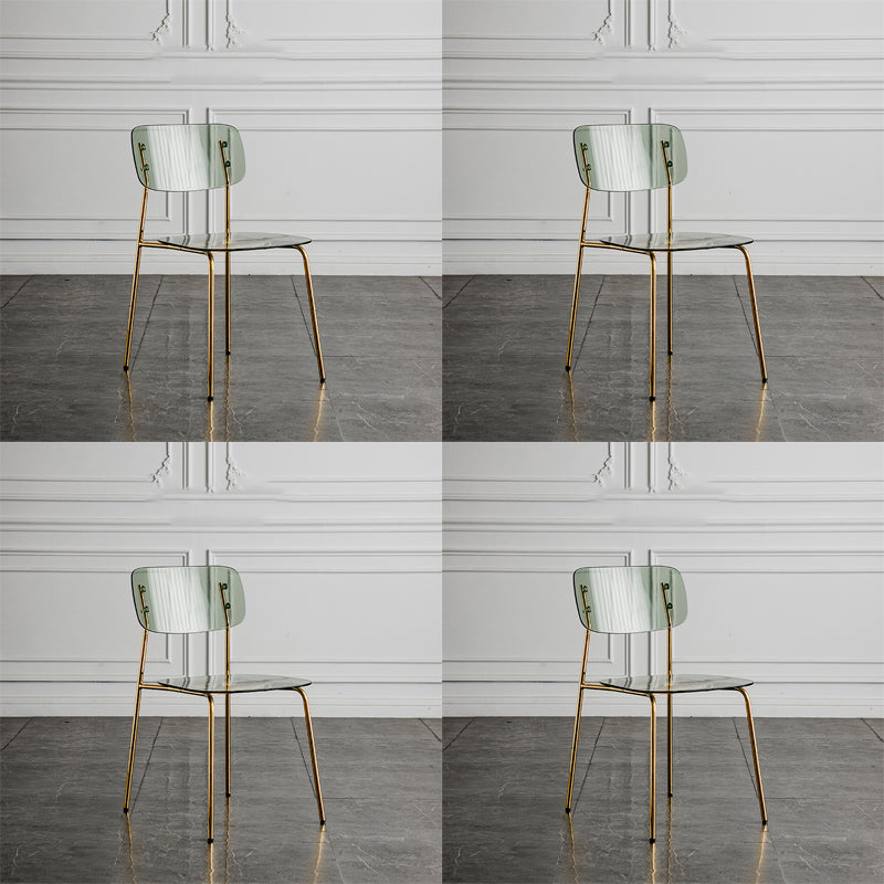 Glam Style Plastic Dining Armless Chairs Stacking Open Back Dining Chair Smoke Gray 4 Piece Set Brass Gold Clearhalo ' kitchen&dining_furn' 'Dining Chairs' 'Dining Tables & Seating' 'dining_chair' 'furn' 'furn_dining_chair' 'Furniture' 'furniture_dining_chair' 'Kitchen & Dining Furniture' 'kitchen' 4038959