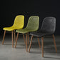Scandinavian Style Plastic Dining Armless Chair Solid Back Chair with Wooden Legs Clearhalo ' kitchen&dining_furn' 'Dining Chairs' 'Dining Tables & Seating' 'dining_chair' 'furn' 'furn_dining_chair' 'Furniture' 'furniture_dining_chair' 'Kitchen & Dining Furniture' 'kitchen' 4039119