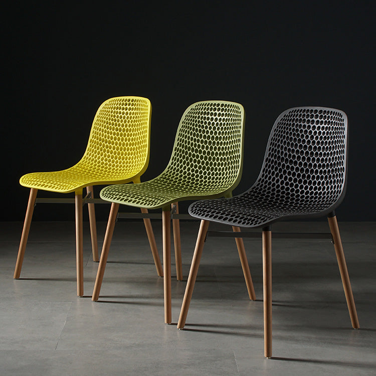 Scandinavian Style Plastic Dining Armless Chair Solid Back Chair with Wooden Legs Clearhalo ' kitchen&dining_furn' 'Dining Chairs' 'Dining Tables & Seating' 'dining_chair' 'furn' 'furn_dining_chair' 'Furniture' 'furniture_dining_chair' 'Kitchen & Dining Furniture' 'kitchen' 4039119