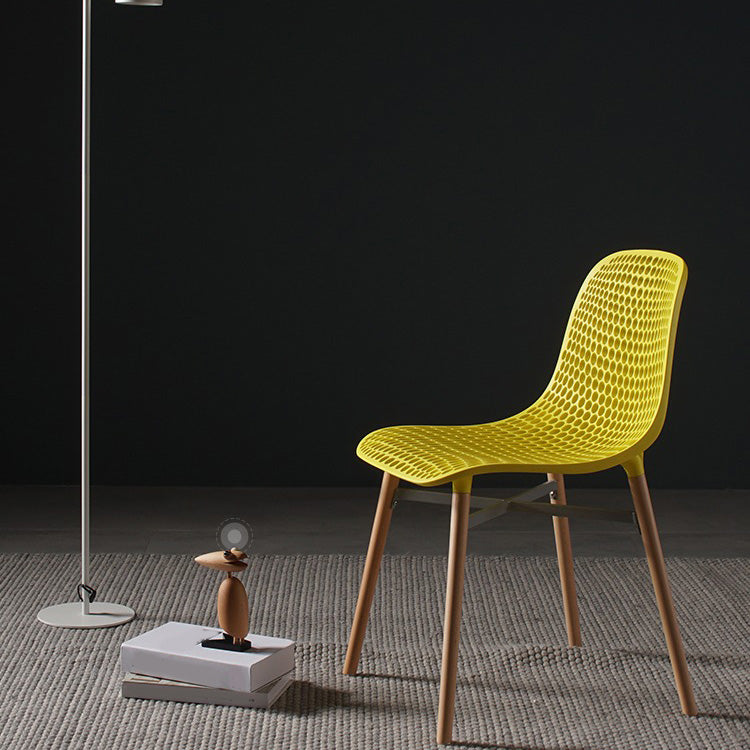 Scandinavian Style Plastic Dining Armless Chair Solid Back Chair with Wooden Legs Clearhalo ' kitchen&dining_furn' 'Dining Chairs' 'Dining Tables & Seating' 'dining_chair' 'furn' 'furn_dining_chair' 'Furniture' 'furniture_dining_chair' 'Kitchen & Dining Furniture' 'kitchen' 4039122