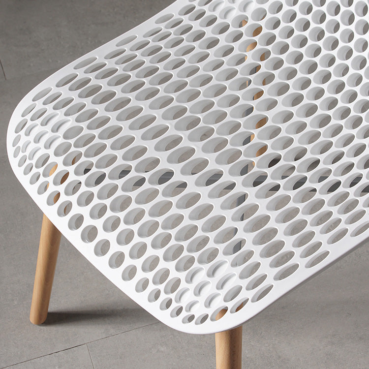 Scandinavian Style Plastic Dining Armless Chair Solid Back Chair with Wooden Legs Clearhalo ' kitchen&dining_furn' 'Dining Chairs' 'Dining Tables & Seating' 'dining_chair' 'furn' 'furn_dining_chair' 'Furniture' 'furniture_dining_chair' 'Kitchen & Dining Furniture' 'kitchen' 4039128