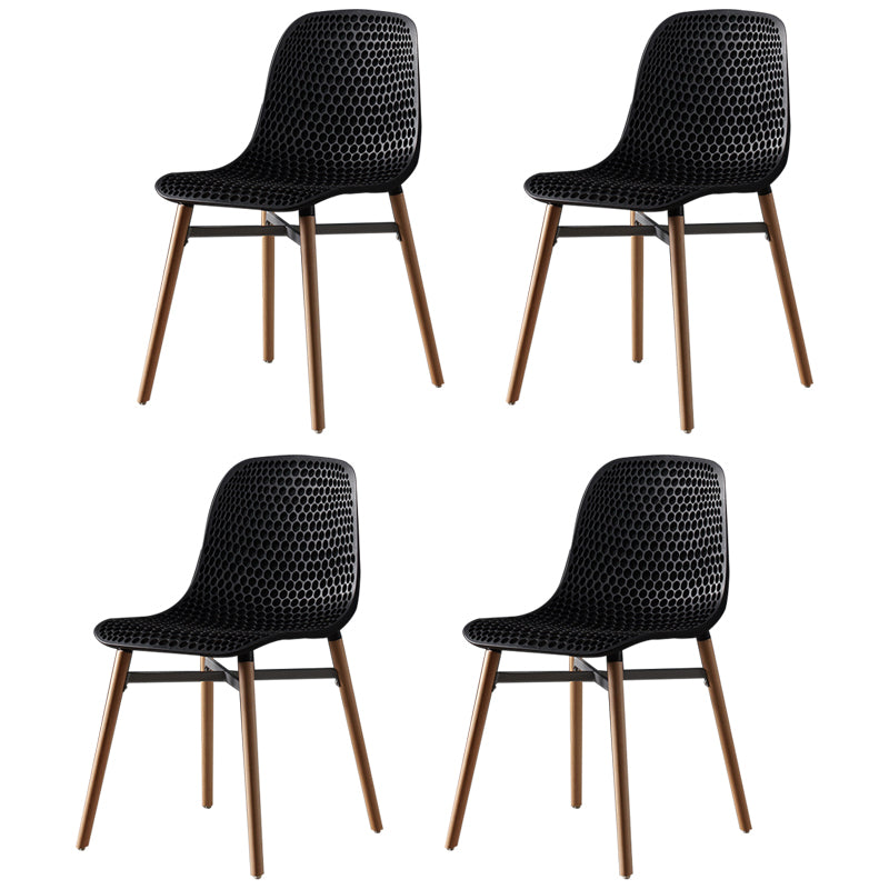 Scandinavian Style Plastic Dining Armless Chair Solid Back Chair with Wooden Legs Black 4 Piece Set Clearhalo ' kitchen&dining_furn' 'Dining Chairs' 'Dining Tables & Seating' 'dining_chair' 'furn' 'furn_dining_chair' 'Furniture' 'furniture_dining_chair' 'Kitchen & Dining Furniture' 'kitchen' 4039131