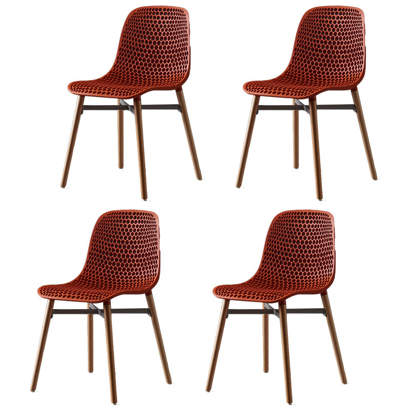 Scandinavian Style Plastic Dining Armless Chair Solid Back Chair with Wooden Legs Red 4 Piece Set Clearhalo ' kitchen&dining_furn' 'Dining Chairs' 'Dining Tables & Seating' 'dining_chair' 'furn' 'furn_dining_chair' 'Furniture' 'furniture_dining_chair' 'Kitchen & Dining Furniture' 'kitchen' 4039143