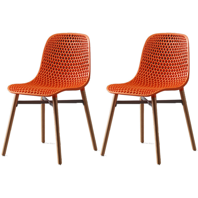 Scandinavian Style Plastic Dining Armless Chair Solid Back Chair with Wooden Legs Orange 2 Piece Set Clearhalo ' kitchen&dining_furn' 'Dining Chairs' 'Dining Tables & Seating' 'dining_chair' 'furn' 'furn_dining_chair' 'Furniture' 'furniture_dining_chair' 'Kitchen & Dining Furniture' 'kitchen' 4039145