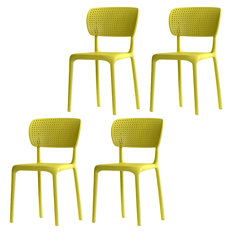 Contemporary Plastic Dining Armless Chair Open Back Dining Side Chairs Yellow 4 Piece Set Clearhalo ' kitchen&dining_furn' 'Dining Chairs' 'Dining Tables & Seating' 'dining_chair' 'furn' 'furn_dining_chair' 'Furniture' 'furniture_dining_chair' 'Kitchen & Dining Furniture' 'kitchen' 4039966