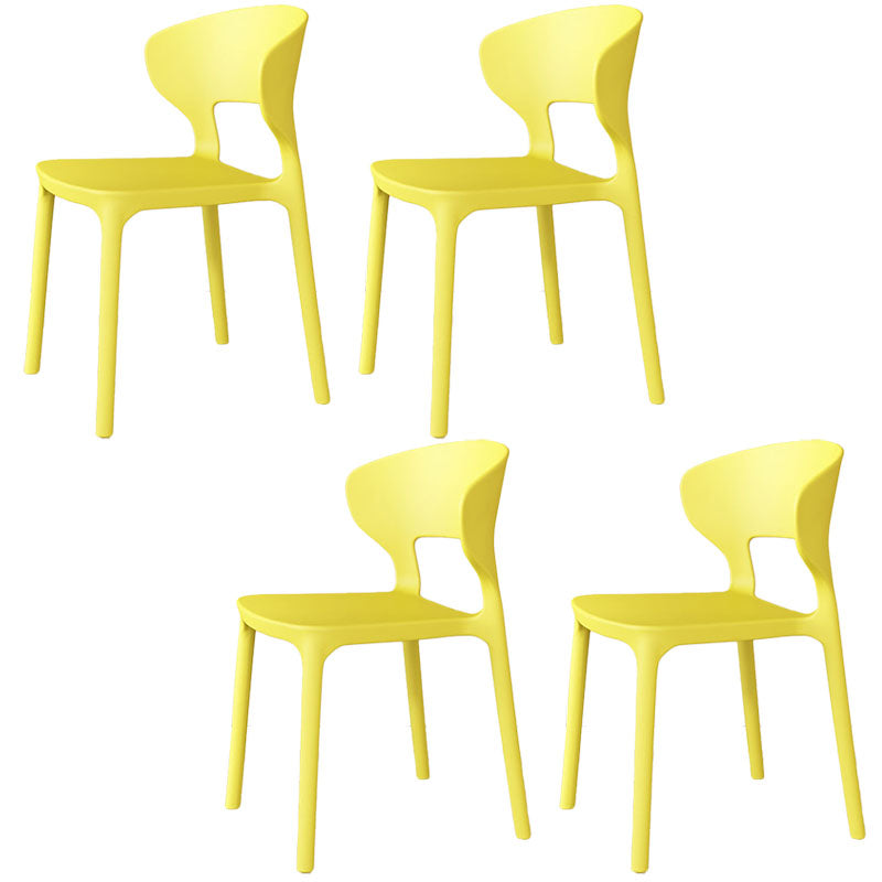 Glam Style Dining Chairs Plastic Dining Armless Side Chair for Kitchen Lemon Yellow 4 Piece Set Clearhalo ' kitchen&dining_furn' 'Dining Chairs' 'Dining Tables & Seating' 'dining_chair' 'furn' 'furn_dining_chair' 'Furniture' 'furniture_dining_chair' 'Kitchen & Dining Furniture' 'kitchen' 4131055