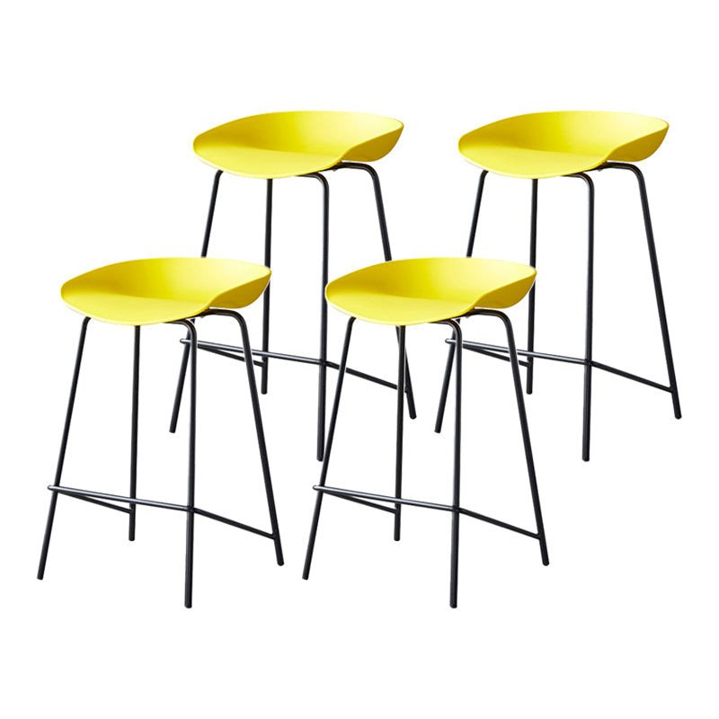 Modern Bar Stool Armless Plastic Indoor Barstool with Footrest Steel Base Yellow 4 Piece Set Counter Stool(26"H) Clearhalo 'Bar Furniture' 'Bar Stools' 'bar_stools' 'furn' 'furn_bar_stools' 'furniture_bar_stools' 'Kitchen & Dining Furniture' 'kitchen&dining_furn' 'kitchen' 'kitchen_furn' Furniture' 4184053