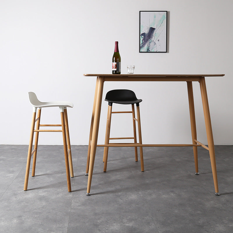 Modern Counter Bar Stool Armless Plastic Indoor Bar Stool with Footrest and Wood Base Clearhalo 'Bar Furniture' 'Bar Stools' 'bar_stools' 'furn' 'furn_bar_stools' 'furniture_bar_stools' 'Kitchen & Dining Furniture' 'kitchen&dining_furn' 'kitchen' 'kitchen_furn' Furniture' 4184415