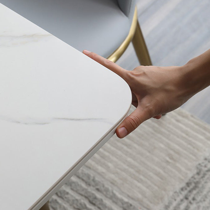 Rectangle Traditional Luxury Dining Table White Sintered Stone Table with 4 Gold Legs Clearhalo ' dining_table' 'Dining Tables & Seating' 'Dining Tables' 'furn' 'furn_dining_table' 'Furniture' 'furniture_dining_table' 'Kitchen & Dining Furniture' 'kitchen&dining_furn' 'kitchen' 'kitchen_dining_table' 4196876