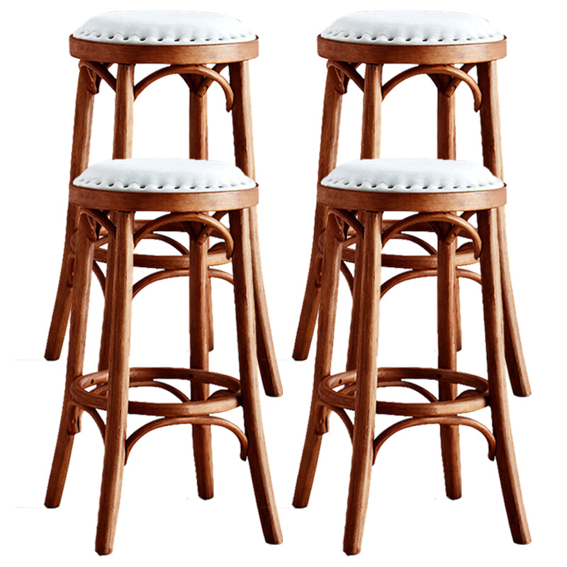 Industrial Wood Quilted Distressed Barstool 29.5" H Indoor Tall Stool with Round Seat Tan 4 Piece Set Backless Clearhalo 'Bar Furniture' 'Bar Stools' 'bar_stools' 'furn' 'furn_bar_stools' 'furniture_bar_stools' 'Kitchen & Dining Furniture' 'kitchen&dining_furn' 'kitchen' 'kitchen_furn' Furniture' 4198726