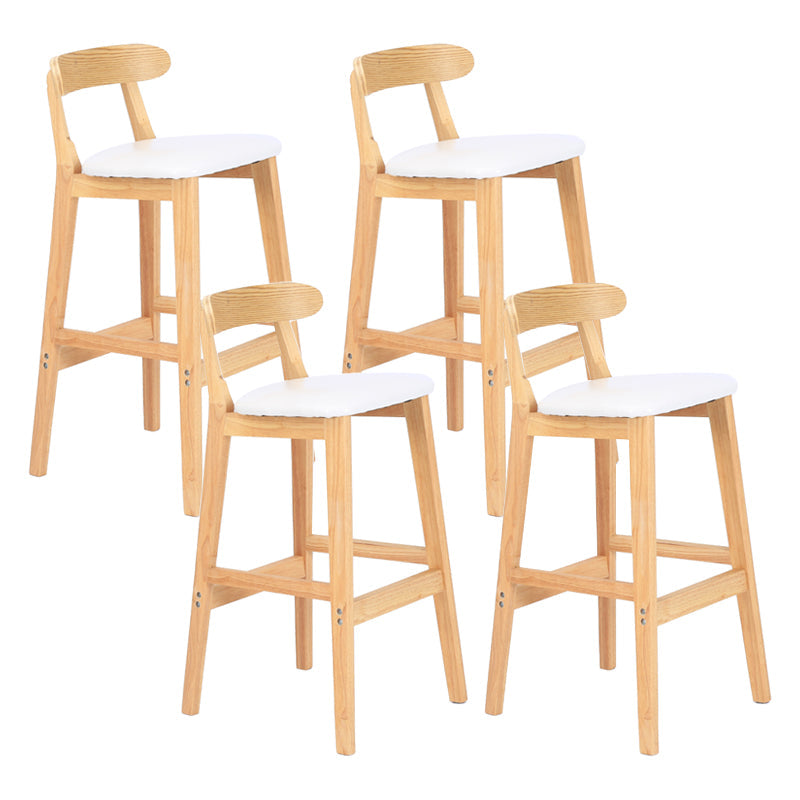 Modern Armless Counter Stool Wood Household Bar Stool with Pedal and Cushion White Natural 4 Piece Set Clearhalo 'Bar Furniture' 'Bar Stools' 'bar_stools' 'furn' 'furn_bar_stools' 'furniture_bar_stools' 'Kitchen & Dining Furniture' 'kitchen&dining_furn' 'kitchen' 'kitchen_furn' Furniture' 4212107