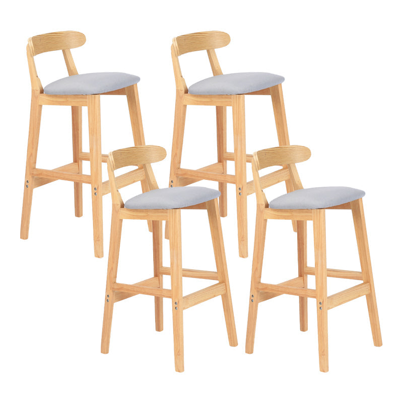 Modern Armless Counter Stool Wood Household Bar Stool with Pedal and Cushion Light Gray Natural 4 Piece Set Clearhalo 'Bar Furniture' 'Bar Stools' 'bar_stools' 'furn' 'furn_bar_stools' 'furniture_bar_stools' 'Kitchen & Dining Furniture' 'kitchen&dining_furn' 'kitchen' 'kitchen_furn' Furniture' 4212113