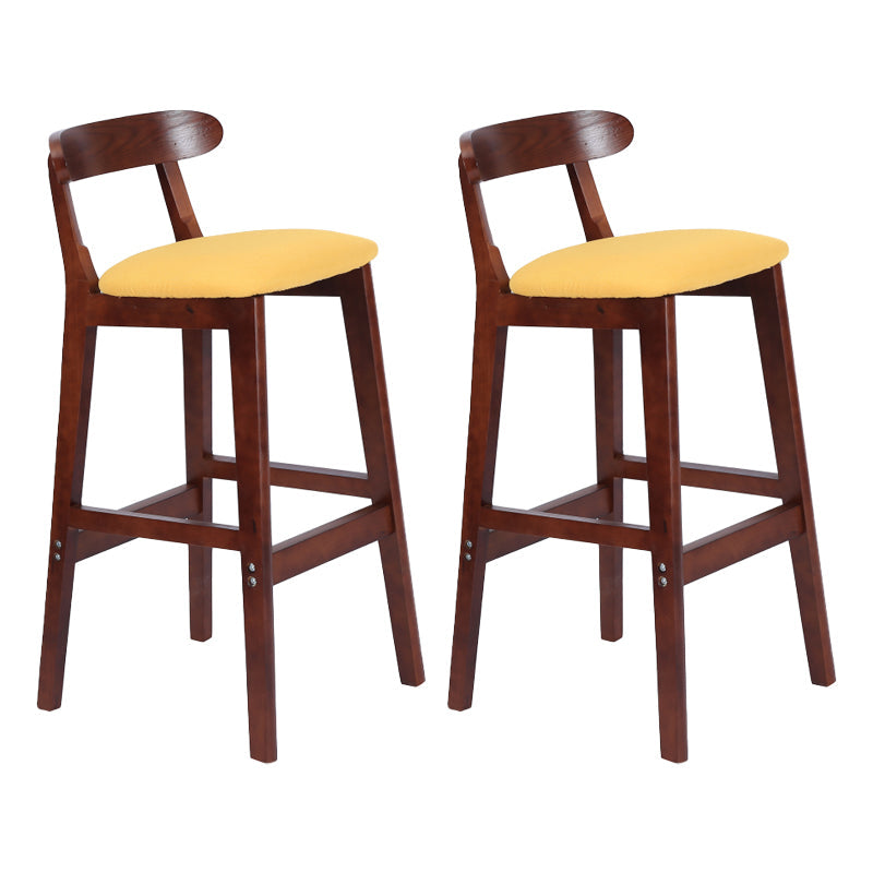 Modern Armless Counter Stool Wood Household Bar Stool with Pedal and Cushion Light Yellow Brown 2 Piece Set Clearhalo 'Bar Furniture' 'Bar Stools' 'bar_stools' 'furn' 'furn_bar_stools' 'furniture_bar_stools' 'Kitchen & Dining Furniture' 'kitchen&dining_furn' 'kitchen' 'kitchen_furn' Furniture' 4212115