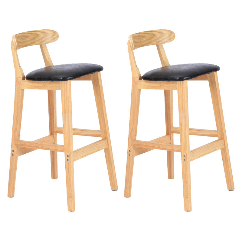 Modern Armless Counter Stool Wood Household Bar Stool with Pedal and Cushion Black Natural 2 Piece Set Clearhalo 'Bar Furniture' 'Bar Stools' 'bar_stools' 'furn' 'furn_bar_stools' 'furniture_bar_stools' 'Kitchen & Dining Furniture' 'kitchen&dining_furn' 'kitchen' 'kitchen_furn' Furniture' 4212157