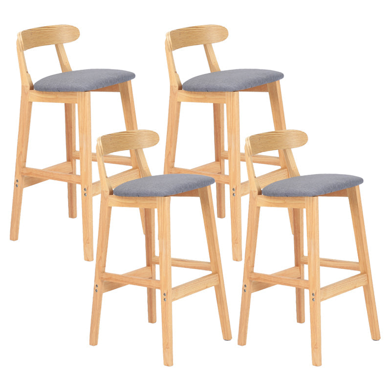Modern Armless Counter Stool Wood Household Bar Stool with Pedal and Cushion Dark Gray Natural 4 Piece Set Clearhalo 'Bar Furniture' 'Bar Stools' 'bar_stools' 'furn' 'furn_bar_stools' 'furniture_bar_stools' 'Kitchen & Dining Furniture' 'kitchen&dining_furn' 'kitchen' 'kitchen_furn' Furniture' 4212167