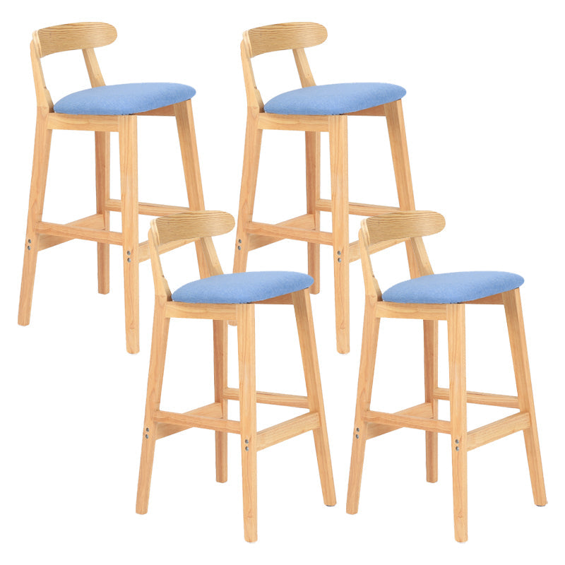 Modern Armless Counter Stool Wood Household Bar Stool with Pedal and Cushion Sky Blue Natural 4 Piece Set Clearhalo 'Bar Furniture' 'Bar Stools' 'bar_stools' 'furn' 'furn_bar_stools' 'furniture_bar_stools' 'Kitchen & Dining Furniture' 'kitchen&dining_furn' 'kitchen' 'kitchen_furn' Furniture' 4212179