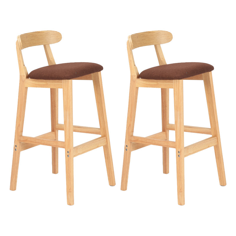 Modern Armless Counter Stool Wood Household Bar Stool with Pedal and Cushion Coffee Natural 2 Piece Set Clearhalo 'Bar Furniture' 'Bar Stools' 'bar_stools' 'furn' 'furn_bar_stools' 'furniture_bar_stools' 'Kitchen & Dining Furniture' 'kitchen&dining_furn' 'kitchen' 'kitchen_furn' Furniture' 4212187